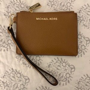 Brand new with receipt Michael Kors cardholder/wristlet
